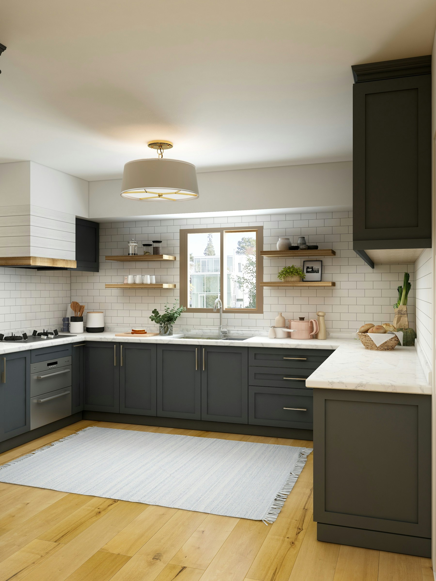 Cuisine aux façades sombres, plan pierre et robinet laiton